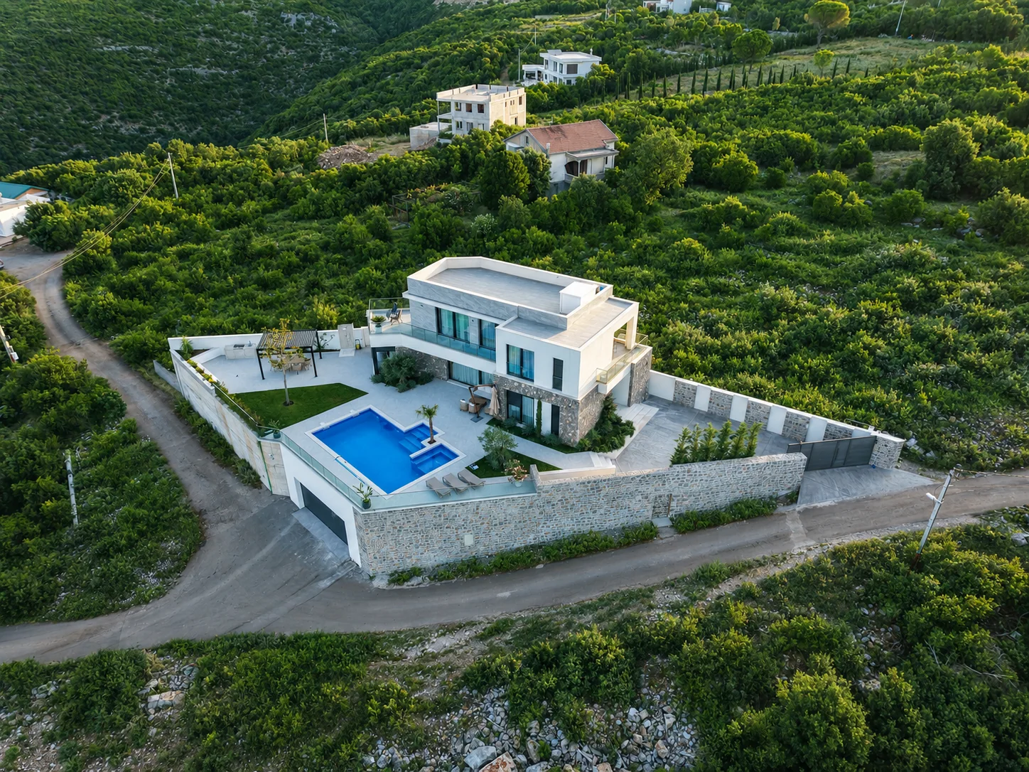 Aerial view of Villa Aventura at golden hour