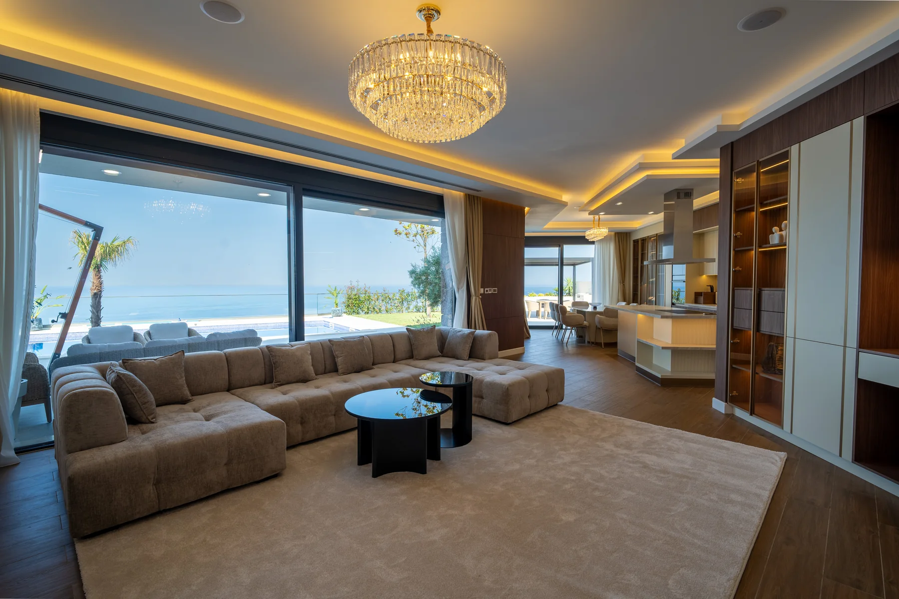 Luxury living room with pool and sea view