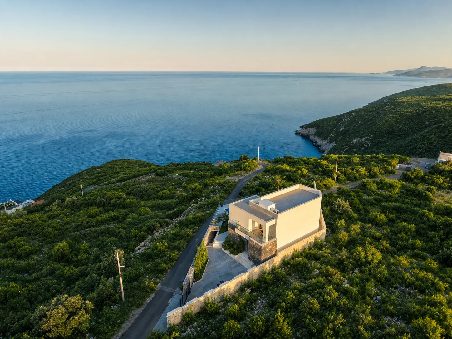 Villa Aventura in the green coastal landscape above the Adriatic